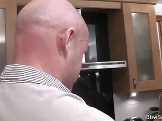 He doggy-fucks BBW at the kitchen